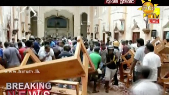 This image made from video provided by Hiru TV shows damage inside St Anthony's Shrine in Colombo.