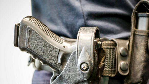The officer is accused of wielding his police-issue gun.