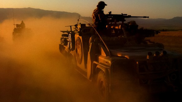 Special Forces Task Group members on patrol in Afghanistan in 2005.