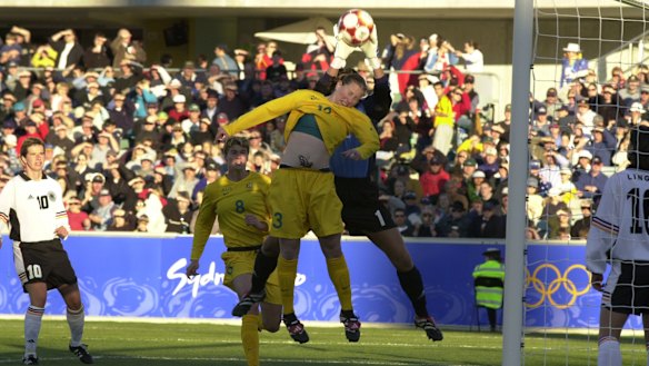 Alicia Ferguson making life uncomfortable for the German goalkeeper at the 2000 Sydney Olympic Games.