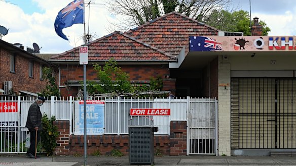 A man walks in front of his home in Fairfield during the COVID-19 lockdown. 