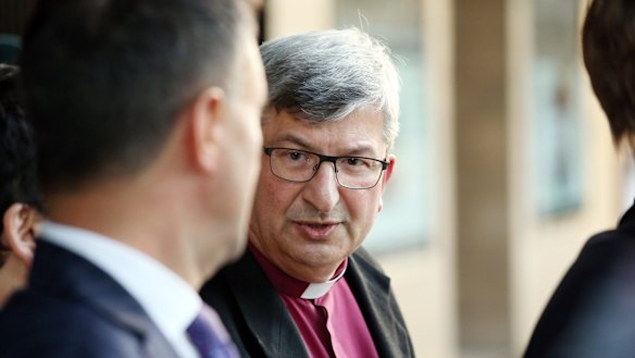 Bishop Roger Herft leaving Newcastle Court House after a session of the Royal Commission into Institutional Responses to Child Sexual Abuse in the Newcastle Anglican Diocese in 2016. 