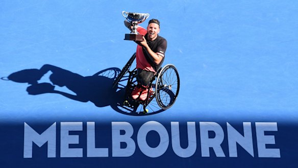 Dylan Alcott triumphs at the Australian Open in January.