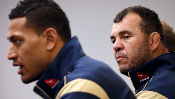 Better days: Israel Folau and Michael Cheika in 2015. 