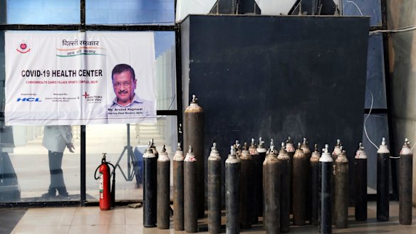 Oxygen tanks outside a ward at the COVID-19 Care Centre set up at the Commonwealth Games Village Sports Complex in New Delhi. There is a shortage of oxygen for patients in hospital and at home.