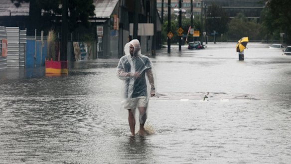 Pelting rain from ex-cyclone Debbie flooded Brisbane.