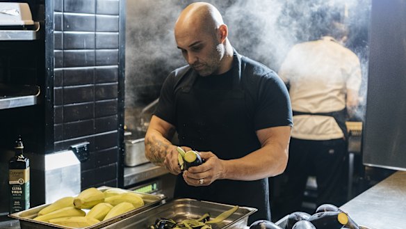 Chef Shane Delia prepares meals for his Providoor delivery service at Maha restaurant, Melbourne.