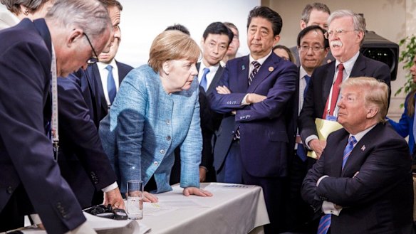 A photograph released by German Chancellor Angela Merkel's office captured the tense relations at the G7 summit.