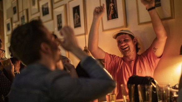 Patrons at Bitter Phew in Darlinghurst enjoy the atmosphere on the first night of no lockout laws in Sydney on Wednesday. 