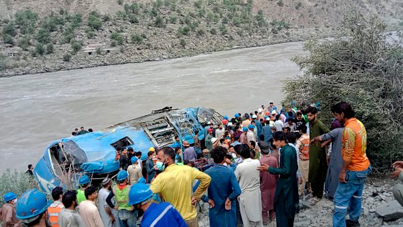 A bus carrying Chinese and Pakistani construction workers in north-west Pakistan fell into a ravine in an incident deemed a terrorist attack.