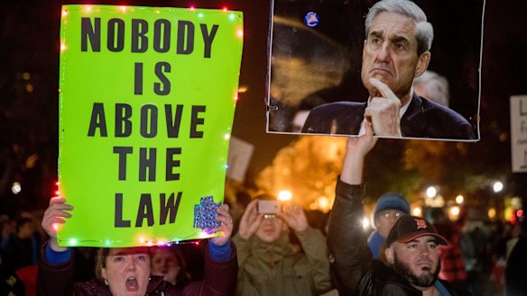 Protesters in front of the White House in Washington on November 8 as part of a nationwide 'Protect Mueller' campaign demanding that Acting US Attorney-General Matthew Whitaker recuse himself from overseeing the Russia probe.