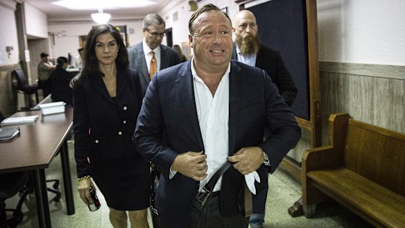 InfoWars host Alex Jones arrives at court in Texas.