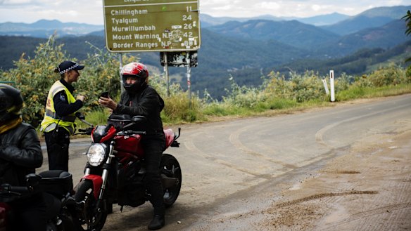 Commuters stopped by police at the Queensland-NSW border checkpoint in the Gold Coast hinterland.