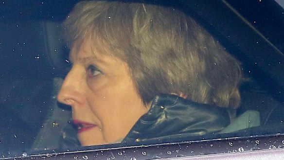 Theresa May outside Parliament.