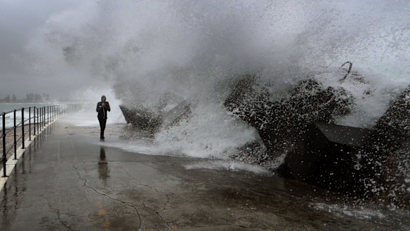 Waves crashing over the Wollongong Breakwall.