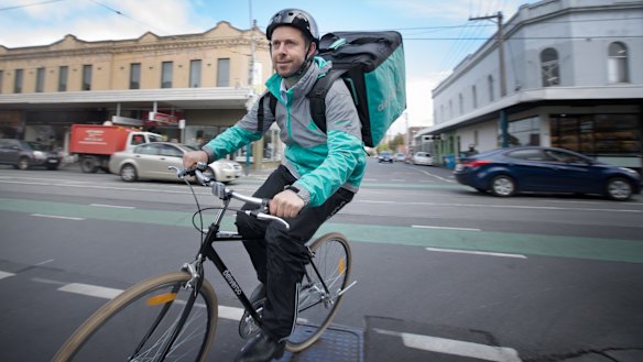 Levi Aron on his Deliveroo bike. 