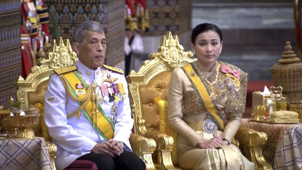 Prefers life abroad: Thailand’s King Maha Vajiralongkorn, left, and Queen Suthida.
