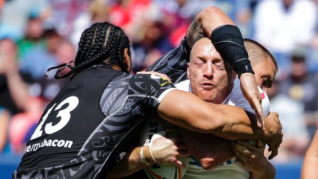No more: New Zealand's Martin Taupau tackles England's James Roby during the one, and it now seems, only Denver Test.