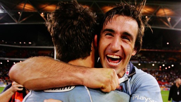 Andrew Johns and Anthony Minicheillo celebrate NSW's 2005 Origin series win.