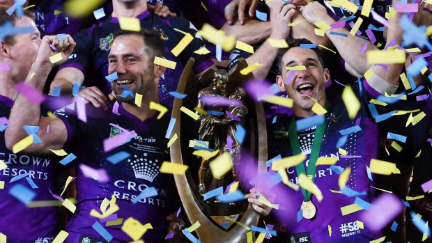 Evergreen: Smith and Billy Slater with the NRL Premiership Trophy in 2017.