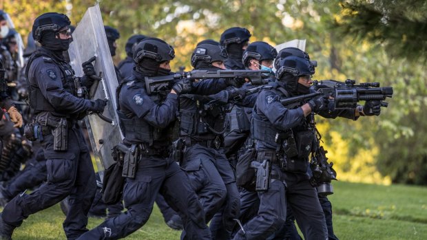 Police confront anti vaccination and anti lockdown protestors during a protest in September.