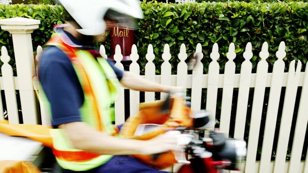 A postie has been awarded compensation of about half a million dollars after being hit by a car.