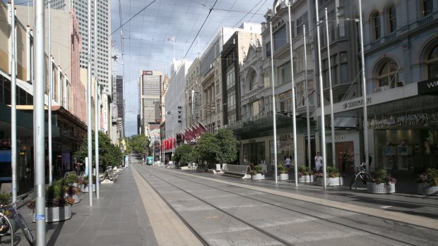 An empty Bourke Street Mall in Melbourne. Without activity in the CBDs of Melbourne and Sydney, the Australian economy will struggle.