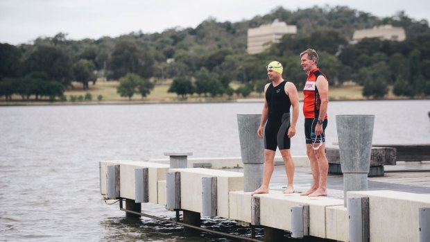 Triathlon ACT's Steve Hough and Craig Johns by Lake Burley Griffin.
