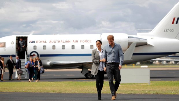 Fashion with a conscience ... Meghan wearing Outland Denim for her arrival to Dubbo with Prince Harry.