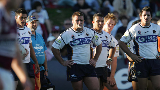 Karmichael Hunt, left, with Shane Webcke and other Brisbane team mates in 2005, during the last game he played at Brookvale Oval. 