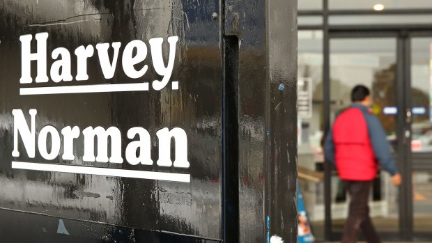 Harvey Norman has told investors to expect a 20 per cent boost to profits for the full year.