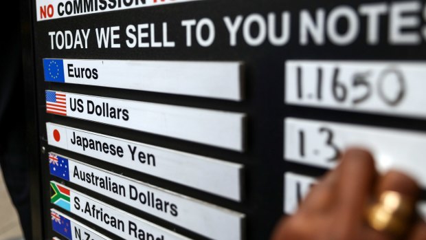 A foreign currency exchange service will back-pay workers $1.3 million.