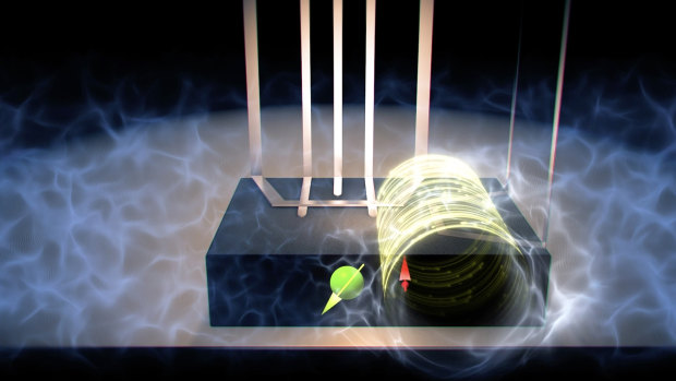 A model of the theoretical quantum noise-cancelling device, with the "microphone" atom on the left in green, and the qubit in red protected by an electromagnetic shield.