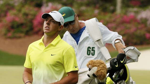Rory Mcilroy of Northern Ireland walks off the 13th green during the final round of the Masters golf tournament at the Augusta National Golf Course in Augusta, Georgia April 12, 2015.  REUTERS/Phil Noble