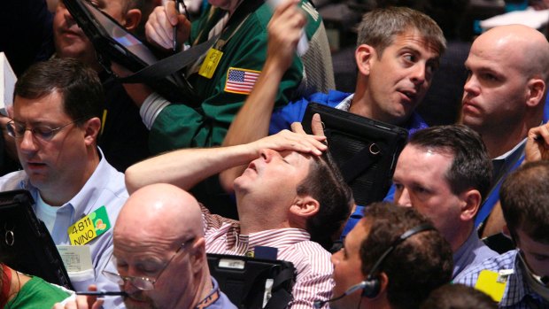 Wall Street traders in September 2008 in the aftermath of the collapse of Lehman Brothers.