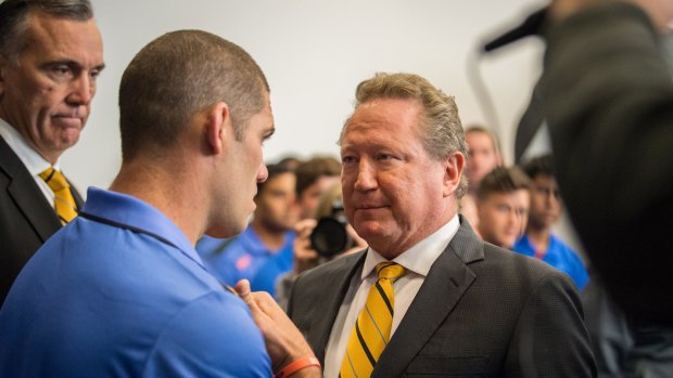 Billionaire Andrew Forrest, who leapt to the Force's aid, has a heart to heart with Hodgson in 2017. 