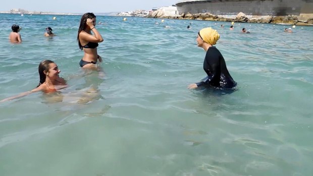 Nesrine Kenza enjoys swimming in her burkini in Marseille, France, in 2016. 