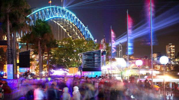 Crowds take in Vivid Festival on Sydney Harbour.