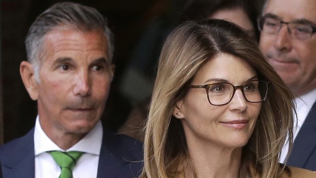 Lori Loughlin and her husband Mossimo Giannulli, pictured in 2019.