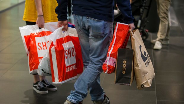 The government is urging Australians to return to the shops and spend but many remain reluctant.