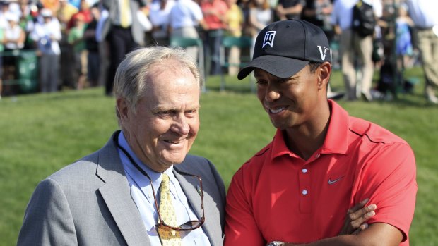 Jack Nicklaus, seen here with Tiger in 2012, acknowledges his long-standing record is back under threat.
