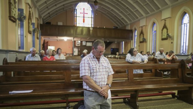 Fourth-generation farmer Adam Cannon during a service at St James' Catholic Church to pray for rain for communities affected by drought.