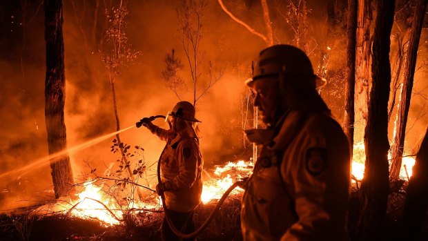 NSW RFS firefighters work through the night.