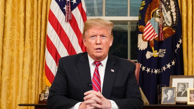 President Donald Trump speaks from the Oval Office of the White House as he gives a prime-time address about border security.