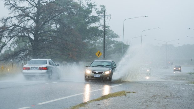 Flooding on Canberra's Fairbairn Avenue after the capital was hit by heavy rain earlier this year. 