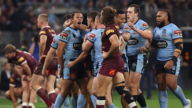 The Blues celebrate another try. 