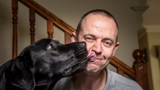 Stuart Wright, who suffers from accute PTSD, has launched Federal Court action against Victoria Police over its refusal to allow him to return to work with his assistance dog Frankie.