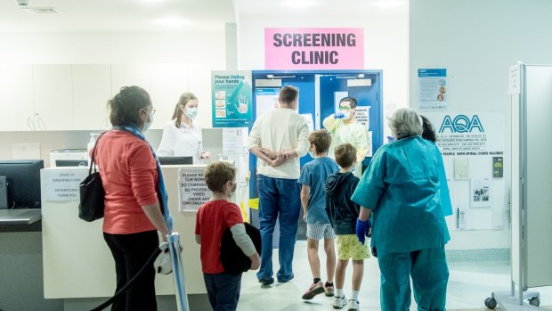 People get tested for coronavirus at the Austin Hospital. 