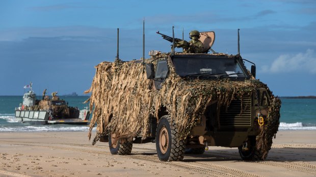 Bushmaster infantry vehicles on Langhams Beach in northern Queensland during Exercise Talisman Saber 17.