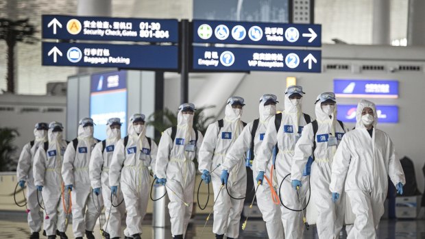 Government workers in China’s Hubei Province in April 2020.